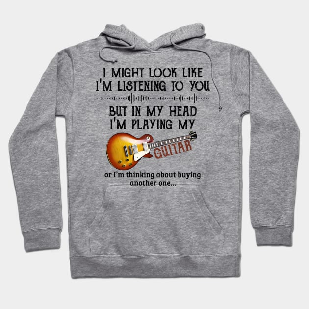 I might look like, I'm listening to you, but in my head, I'm playing my guitar. Hoodie by designathome